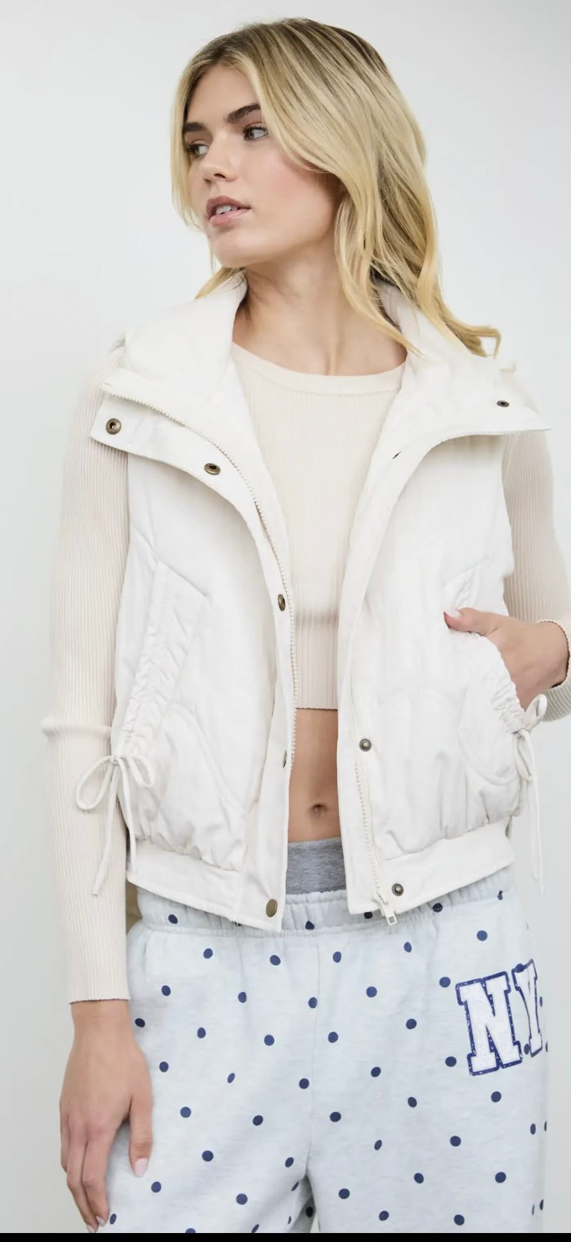 Wave Quilted Snap-Front Stand
Collar Vest